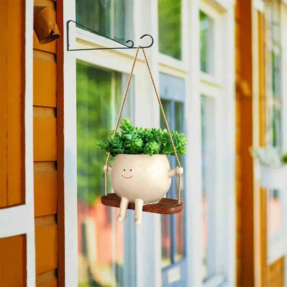 Smiley face hanging planter