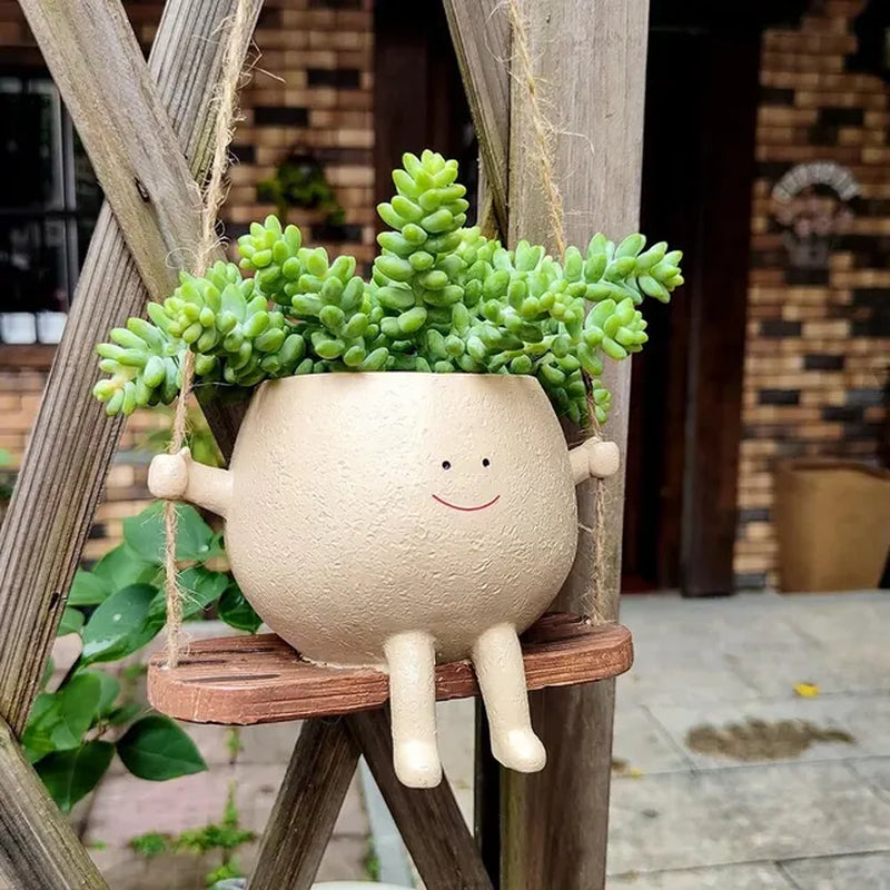 Smiley face hanging planter